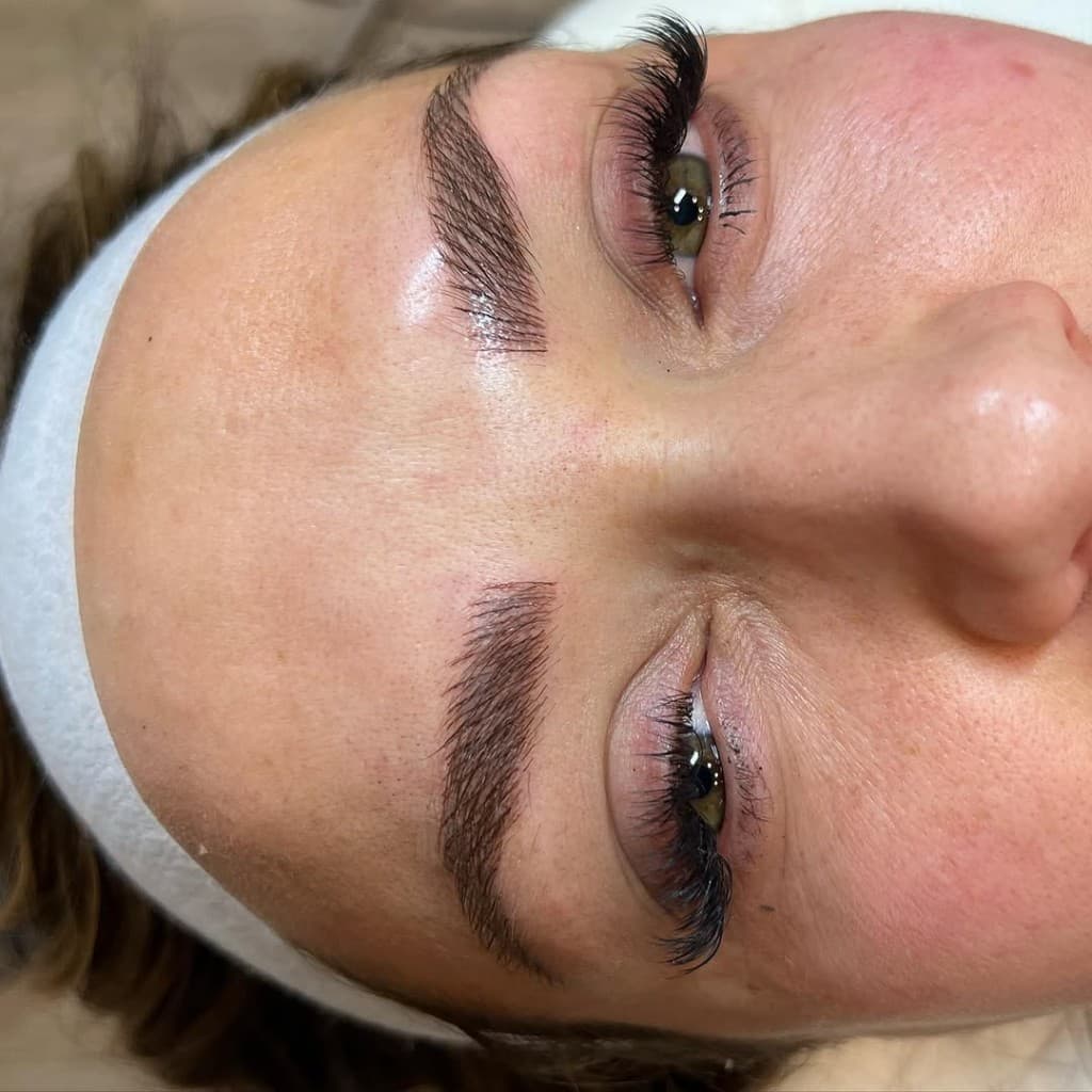 Erica Eskeli performing microblading at Artful Aesthetic Medicine